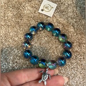 Quartz bead bracelet with turtle charm